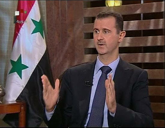 Reprodução de imagem de TV mostra o ditador sírio, Bashar al Assad, em entrevista em agosto