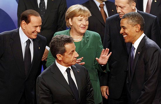 Os chefes de Estado Silvio Berlusconi, Angela Merkel, Barack Obama e Nicolas Sarkozy durante cúpula do G20