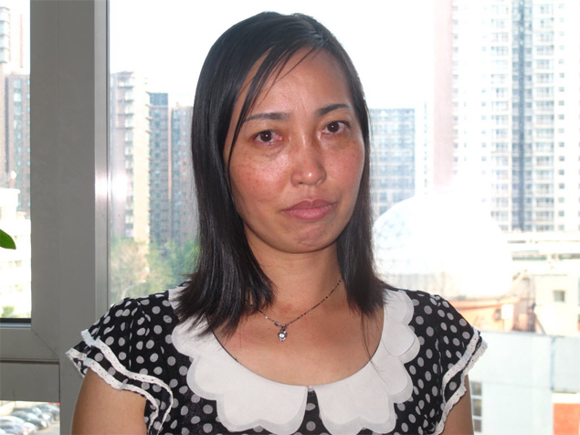 Tang Hui, 40, tornou-se um smbolo de persistncia na China ao ganhar na Justia uma indenizao por ter sido enviada a campo de trabalho forado 