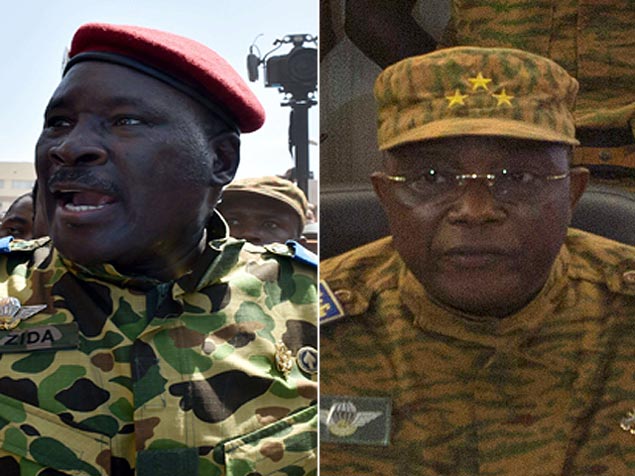 Tenente-coronel Isaac Zida (esq.) e general Honor Traor se autodeclararam presidente de Burkina Fasso aps renncia do ditador