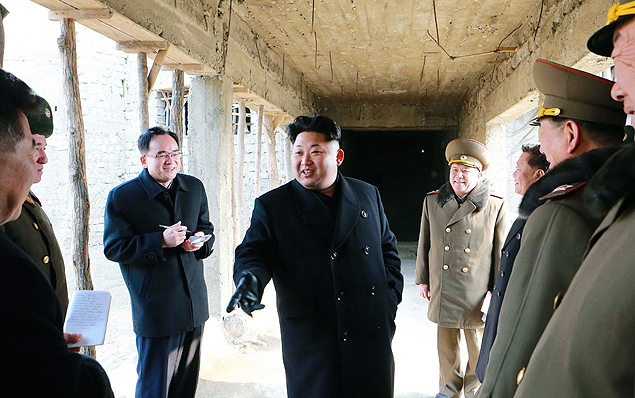 North Korean leader Kim Jong Un (C) provides field guidance to the construction sites of baby Home, orphanage and orphans' primary and secondary schools in Wonsan City, in this undated photo released by North Korea's Korean Central News Agency (KCNA) on February 11, 2015. REUTERS/KCNA (NORTH KOREA - Tags: POLITICS) ATTENTION EDITORS - THIS PICTURE WAS PROVIDED BY A THIRD PARTY. REUTERS IS UNABLE TO INDEPENDENTLY VERIFY THE AUTHENTICITY, CONTENT, LOCATION OR DATE OF THIS IMAGE. FOR EDITORIAL USE ONLY. NOT FOR SALE FOR MARKETING OR ADVERTISING CAMPAIGNS. THIS PICTURE IS DISTRIBUTED EXACTLY AS RECEIVED BY REUTERS, AS A SERVICE TO CLIENTS. NO THIRD PARTY SALES. NOT FOR USE BY REUTERS THIRD PARTY DISTRIBUTORS. SOUTH KOREA OUT. NO COMMERCIAL OR EDITORIAL SALES IN SOUTH KOREA ORG XMIT: SIN101
