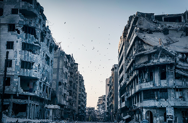 Edifcios destrudos pela guerra em Homs; Sria entra no seu quinto ano de conflito civil