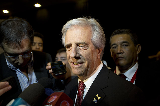 Uruguay's President Tabare Vazquez speaks to reporters as he arrives to the CEO Summit of the Americas in Panama City, Friday, April 10, 2015. The second CEO Summit organized by Panama's government and the Inter-American Development Bank, gathers business and political leaders, just before the start of the VII Summit of the Americas. (AP Photo/Moises Castillo) ORG XMIT: MCX103