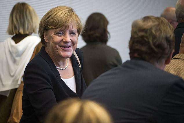 A chanceler Angela Merkel durante reunio de deputados de seu partido no Parlamento, em Berlim