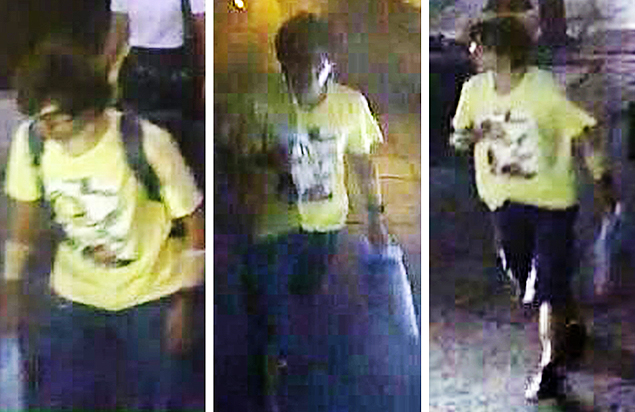 This Aug. 17, 2015, image, released by Royal Thai Police spokesman Lt. Gen. Prawut Thavornsiri shows a man wearing a yellow T-shirt near the Erawan Shrine before an explosion occurred in Bangkok, Thailand.Prawut said he believes the man is a suspect in the blast that killed a number of people at a shrine in downtown Bangkok on Monday night. (Royal Thai Police via AP) ORG XMIT: BKKS304