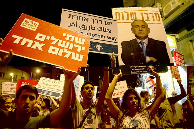 Judeus e árabes seguram cartazes onde se lê: "Duas Jerusalém, uma paz", em ato na cidade