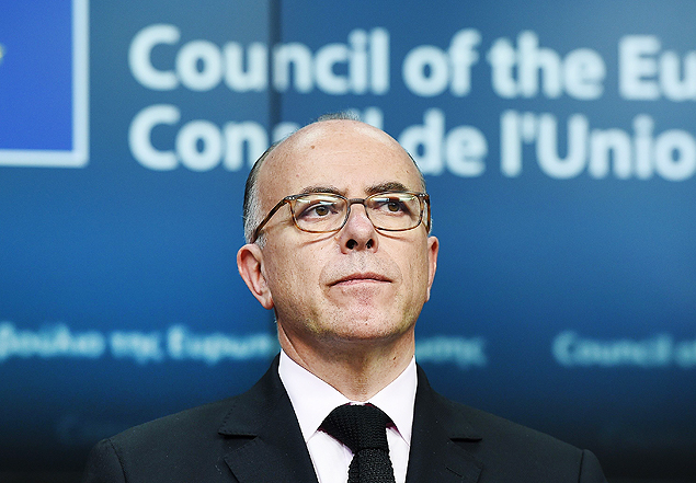 French Interior Minister Bernard Cazeneuve looks on as he addresses a press conference at the end of an extraordinary Justice and Home Affairs Council following the attacks in Paris, at the European Council in Brussels, on November 20, 2015. AFP PHOTO / EMMANUEL DUNAND ORG XMIT: ED6576
