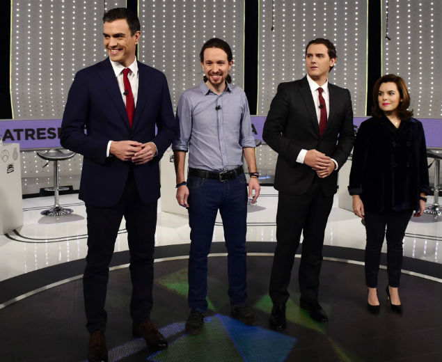 Leader of Spanish Socialist Party (PSOE) Pedro Sanchez (L), leader of left wing party Podemos Pablo Iglesias (2nd L), center-right party Ciudadanos leader Albert Rivera (2nd R) and Vice President of the Spanish government and Partido Popular PP's number two on the Madrid list for the upcoming December 20 general election, Soraya Saenz de Santamaria (R) pose before participating in an electoral TV debate organized by Antena 3 television at San Sebastian de los Reyes, near Madrid on December 7, 2015. AFP PHOTO / PIERRE-PHILIPPE MARCOU ORG XMIT: PPM1282