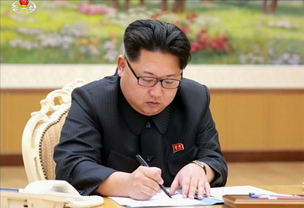 This picture taken from North Korean TV and released by South Korean news agency Yonhap on January 6, 2016 shows North Korean leader Kim Jong-Un signing a document of a hydrogen bomb test in Pyongyang. North Korea announced on January 6 it had successfully carried out its first hydrogen bomb test, a development that, if confirmed, would marking a stunning step forward in its nuclear development. REPUBLIC OF KOREA OUT -- RESTRICTED TO SUBSCRIPTION USE -- AFP PHOTO / North Korean TV via YONHAP -- NO MARKETING - NO ADVERTISING CAMPAIGNS - DISTRIBUTED AS A SERVICE TO CLIENTS -- THIS PICTURE WAS MADE AVAILABLE BY A THIRD PARTY. AFP CAN NOT INDEPENDENTLY VERIFY THE AUTHENTICITY, LOCATION, DATE AND CONTENT OF THIS IMAGE. THIS PHOTO IS DISTRIBUTED EXACTLY AS RECEIVED BY AFP. ORG XMIT: JYJ689