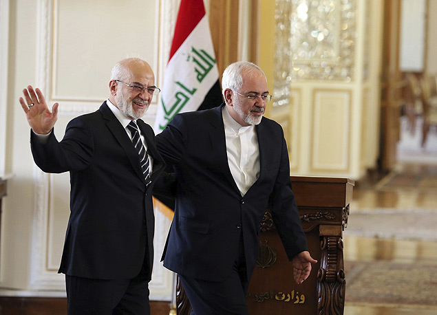 O chanceler iraniano, Mohamad Zarif ( dir.), recebe homlogo iraquiano, Ibrahim al-Jaafari, em Teer