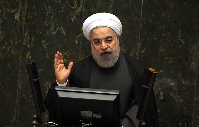 Iranian President Hassan Rouhani delivers a speech to parliament before presenting the proposed annual budget in the capital Tehran, on January 17, 2016, after sanctions were lifted under Tehran's nuclear deal with world powers. Iran has "opened a new chapter" in its ties with the world, President Hassan Rouhani said, hours after sanctions were lifted under its historic nuclear deal with global powers. A day earlier the UN's atomic watchdog confirmed that Iran has complied with its obligations under the July deal and the United States and European Union announced it was lifting the sanctions that have for years crippled the country's economy. / AFP / ATTA KENARE ORG XMIT: AK084
