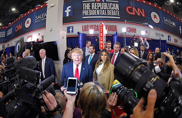 Donald Trump is joined by his wife Melania in the spin room following the CNN Republican presidential debate at the Venetian Hotel & Casino on Tuesday, Dec. 15, 2015, in Las Vegas. (AP Photo/Mark J. Terrill) ORG XMIT: NVTS165