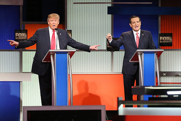NORTH CHARLESTON, SC - JANUARY 14: Republican presidential candidates (L-R) Donald Trump and Sen. Ted Cruz (R-TX) participate in the Fox Business Network Republican presidential debate at the North Charleston Coliseum and Performing Arts Center on January 14, 2016 in North Charleston, South Carolina. The sixth Republican debate is held in two parts, one main debate for the top seven candidates, and another for three other candidates lower in the current polls. Scott Olson/Getty Images/AFP == FOR NEWSPAPERS, INTERNET, TELCOS & TELEVISION USE ONLY ==