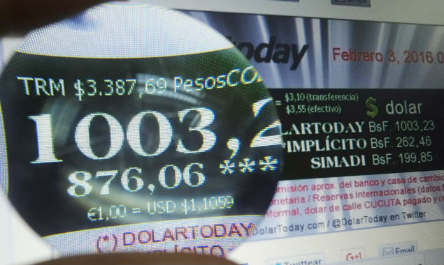  Today website showing the price of the dollar in Caracas on February 3, 2106. In Venezuela there are no dollars, but the economy of the country and part of daily life are disrupted by the black market currency, which on Wednesday surpassed the barrier of 1,000 bolivars, nearly 160 times the lowest official rate. AFP PHOTO/JUAN BARRETO ORG XMIT: VEN427