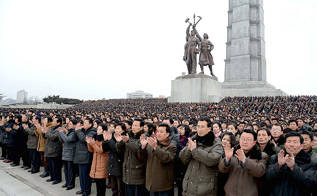 This photo dated on February 8, 2016 and released by North Korea's official Korean Central News Agency (KCNA) on February 9, 2016 shows North Korean people and soldiers celebrating a report on North Korea's rocket launch in Pyongyang. North Korea said on February 7, it had successfully put a satellite into orbit, with a rocket launch widely condemned as a ballistic missile test for a weapons delivery system to strike the US mainland. - - - REPUBLIC OF KOREA OUT AFP PHOTO / KCNA via KNS THIS PICTURE WAS MADE AVAILABLE BY A THIRD PARTY. AFP CAN NOT INDEPENDENTLY VERIFY THE AUTHENTICITY, LOCATION, DATE AND CONTENT OF THIS IMAGE. THIS PHOTO IS DISTRIBUTED EXACTLY AS RECEIVED BY AFP. ---EDITORS NOTE--- RESTRICTED TO EDITORIAL USE - MANDATORY CREDIT 