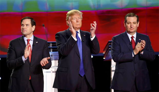 Republican U.S. Presidential candidates (L-R) Senator Marco Rubio, businessman Donald Trump and Senator Ted Cruz applaud before the start of the debate sponsored by CNN for the 2016 Republican U.S. presidential candidates in Houston, Texas, February 25, 2016. REUTERS/Mike Stone ORG XMIT: HOU503