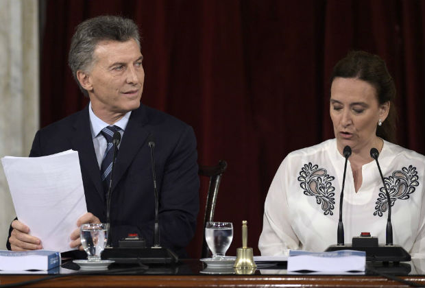 Argentine President Mauricio Macri (L) gestures next to Argentina's Vice President Gabriela Michetti during the inauguration of the 134th period of ordinary sessions at the Congress in Buenos Aires, Argentina on March 1, 2016. AFP PHOTO / JUAN MABROMATA ORG XMIT: MAB185