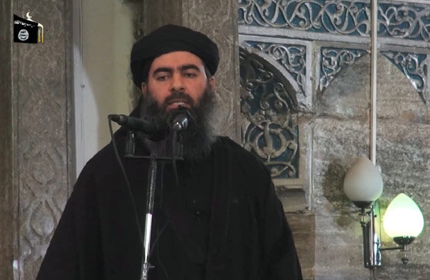 (FILES) - An image grab taken from a propaganda video released on July 5, 2014 by al-Furqan Media allegedly shows the leader of the Islamic State (IS) jihadist group, Abu Bakr al-Baghdadi, adressing Muslim worshippers at a mosque in the militant-held northern Iraqi city of Mosul. Iraq claimed on October 11, 2015 to have struck a convoy carrying Islamic State group leader Abu Bakr al-Baghdadi in an air raid near the Syrian border but said his fate was unknown. AFP PHOTO / HO / AL-FURQAN MEDIA == RESTRICTED TO EDITORIAL USE - MANDATORY CREDIT 