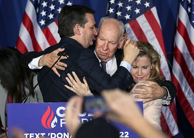 INDIANAPOLIS, IN - MAY 03: Republican presidential candidate, Sen. Ted Cruz (R-TX) hugs his father, Rafael Cruz and wife Heidi Cruz after announcing the suspension of his campaign during an election night watch party at the Crowne Plaza Downtown Union Station on May 3, 2016 in Indianapolis, Indiana. Cruz lost the Indiana primary to Republican rival Donald Trump. Joe Raedle/Getty Images/AFP == FOR NEWSPAPERS, INTERNET, TELCOS & TELEVISION USE ONLY ==