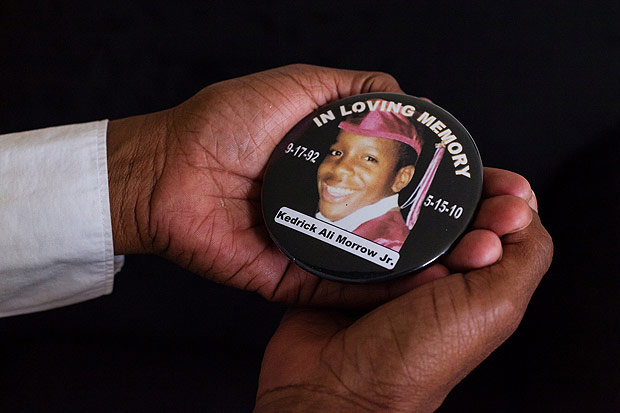 Yearbook Project Collects Stories of Children Killed in Shootings. Shenee Johnson, with a photo of her son, Kedrick Morrow, who was killed in 2010 a month shy of his high school graduation. Credit Heather Walsh for The New York Times 