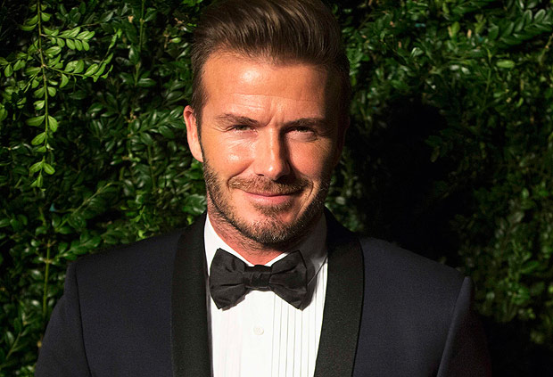 Former British soccer player David Beckham smiles at the Evening Standard Theatre awards in London November 30, 2014. REUTERS/Neil Hall ORG XMIT: LON101