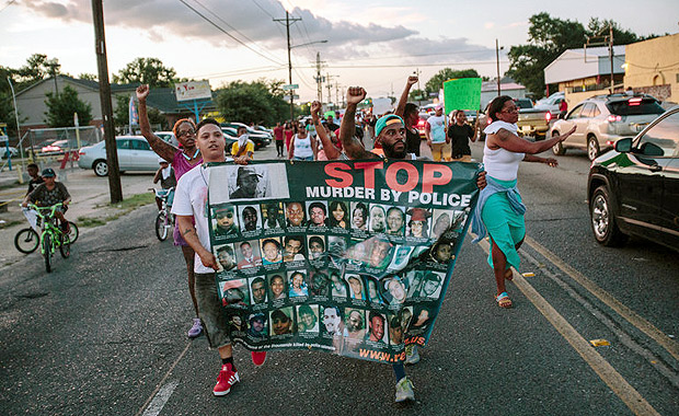 Protesters took to the streets of Baton Rouge, La., on Thursday over the shooting of Alton B. Sterling, a black man, during an encounter with two police officers on Tuesday. Credit William Widmer for The New York Times 