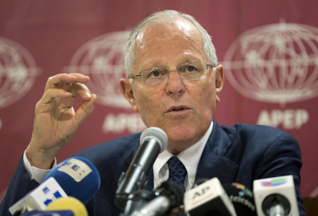  Peru's President-elect Pedro Pablo Kuczynski, speaks during a press conference with foreign journalist in Lima, Peru, Tuesday, July 26, 2016. Kuczynski's fledgling party won just 18 of 130 seats in the legislature, meaning that to reach his goals he'll need to form alliances. Kuczynski, also known as PPK, will take office on July 28th.(AP Photo/Martin Mejia) ORG XMIT: LIM101