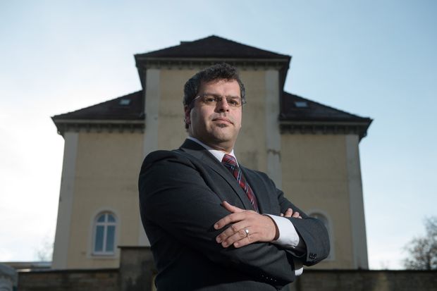 FILE - In this Nov. 24, 2015 file picture Jens Rommel, the head of a special prosecutors' office that looks into Nazi war crimes,poses in Ludwigsburg, Germany. German prosecutors say they have tracked down eight people who allegedly worked at the Nazis' Stutthof concentration camp during World War II and are considering whether they can be charged as accessories to murder. Jens Rommel, the head of a special prosecutors' office that looks into Nazi war crimes, told news agency dpa on Tuesday Aug. 9, 2016 that four male suspects worked as guards and four women were secretaries or telephone operators. (Marijan Murat/dpa via AP,file) ORG XMIT: MBER101