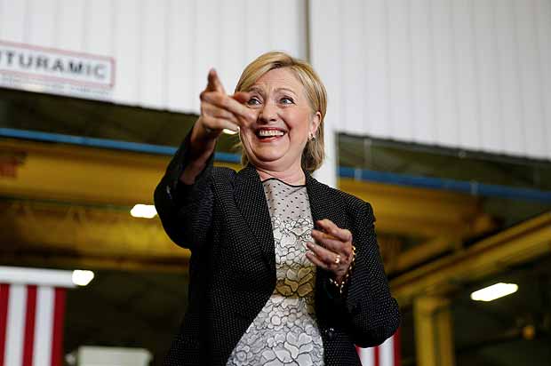 U.S. Democratic presidential nominee Hillary Clinton points to supporters as she is introduced at Futuramic Tool & Engineering in Warren, Michigan August 11, 2016. REUTERS/Chris Keane ORG XMIT: CJK115