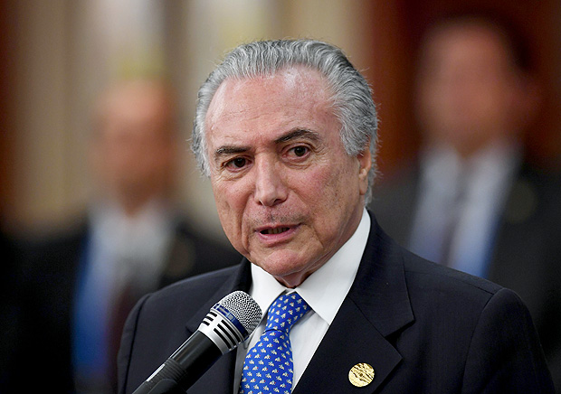 Brazil's President Michel Temer speaks at a press conference on the sidelines of the G20 Leaders Summit in Hangzhou, in China's eastern Zhejiang province on September 4, 2016. G20 leaders confront a sluggish global economy and the winds of populism as they open annual talks, but the long war in Syria and the South China Sea territorial dispute hang over the summit. / AFP PHOTO / GREG BAKER ORG XMIT: GB6377