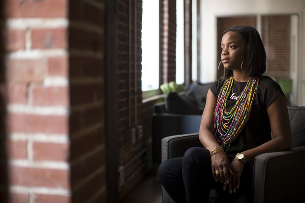 Brittany Packnett, 31, an activist and a leader in the push for police accountability, in downtown St. Louis, Sept. 2, 2016. Packnett and other young blacks say Hillary Clinton is not connecting with black voters, giving Democratic planners concerns about how much support Clinton will have on election day. (Whitney Curtis/The New York Times) - XNYT51