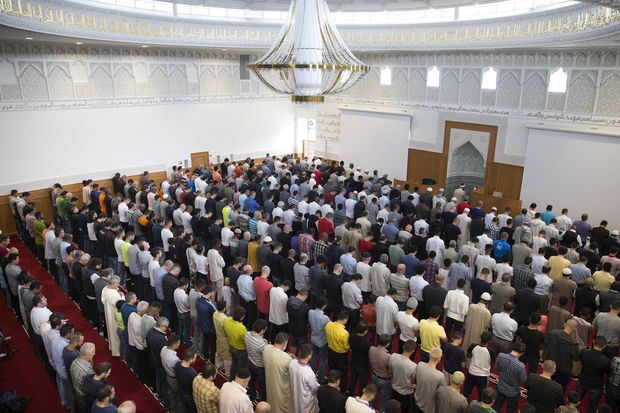 Participants during a Friday prayer in the Grand Mosque of Copenhagen, also known as Hamad Bin Khalifa Civilization Center, in Copenhagen, Denmark, Aug. 5, 2016. The thousands of Muslim asylum seekers pouring into Denmark have spawned a backlash, and questions over whether the country has a latent racial hostility at its core. (Ilvy Njiokiktjien/The New York Times)