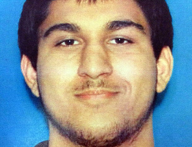 Arcan Cetin, 20, of Oak Harbor is seen in a Washington State Department of Licensing photo released by the Washington State Patrol after they announced his capture in relation to a mass shooting in Burlington, Washington, U.S. September 24, 2016. Washington State Patrol/Handout via Reuters. ATTENTION EDITORS - THIS IMAGE WAS PROVIDED BY A THIRD PARTY. EDITORIAL USE ONLY. THIS PICTURE WAS PROCESSED BY REUTERS TO ENHANCE QUALITY. AN UNPROCESSED VERSION HAS BEEN PROVIDED SEPARATELY. ORG XMIT: TOR508R