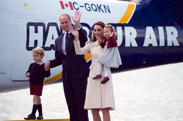 William and Kate, the Duke and Duchess of Cambridge along with their children Prince George and Princess Charlotte get on a float plane as they prepare to depart Victoria, British Columbia, Saturday, Oct. 1, 2016. (Jonathan Hayward/The Canadian Press via AP) ORG XMIT: JOHV126