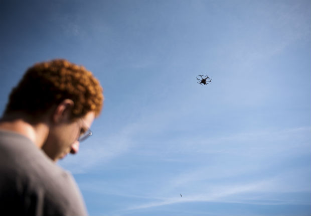Jacob Regenstein, an engineer, during testing of an airborne autonomous drone at Joint Base Cape Cod, Mass., Aug. 25, 2016. The U.S. has put artificial intelligence at the center of its defense strategy, with weapons that can identify targets and make decisions. (Hilary Swift/The New York Times)
