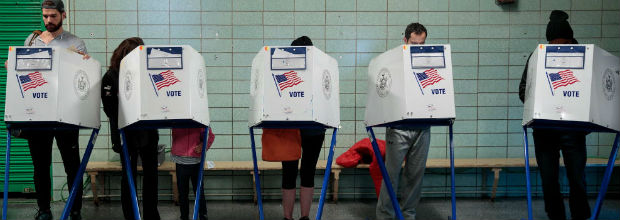 NEW YORK, NY - NOVEMBER 8: People vote at a polling site at Public School 261, November 8, 2016 in New York City. Citizens of the United States will choose between Republican presidential candidate Donald Trump and Democratic presidential candidate Hillary Clinton. Drew Angerer/Getty Images/AFP == FOR NEWSPAPERS, INTERNET, TELCOS & TELEVISION USE