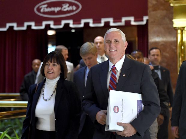  Vice President-elect Mike Pence arrives at Trump Tower for meetings with President-elect Donald Trump November 15, 2016 in New York. Trump,the 70-year-old Republican billionaire who takes office in just nine weeks, was to meet with Vice President-elect Mike Pence to discuss the next round of cabinet appointments. / AFP PHOTO / TIMOTHY A. CLARY ORG XMIT: TC014