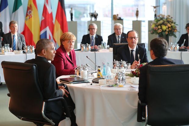 Barack Obama (esq.) em encontro com lderes europeus realizado em Berlim