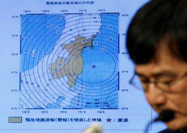  Japan Meteorological Agency's earthquake and volcano observations division director Koji Nakamura addresses a news conference next to the map showing an earthquake epicentre off the coast of Fukushima prefecture, in Tokyo, Japan November 22, 2016. REUTERS/Toru Hanai ORG XMIT: TOK904