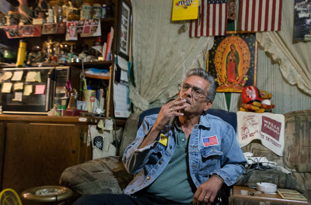 Greg Vialpando, a disabled former automobile body worker, smokes marijuana to manage his chronic back pain at home in Santa Fe, N.M., Nov. 11, 2016. A string of ballot victories for medical marijuana has increased pressure on insurers to cover the costs of such therapy. I would recommend that people use medical marijuana over opioids any day, Vialpando said. (Steven St. John/The New York Times)