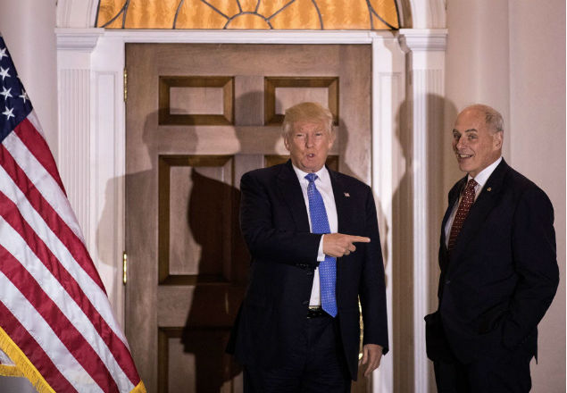 BEDMINSTER TOWNSHIP, NJ - NOVEMBER 20: (L to R) President-elect Donald Trump points at U.S. Marine Corps General John Kelly before their meeting at Trump International Golf Club, November 20, 2016 in Bedminster Township, New Jersey. Trump and his transition team are in the process of filling cabinet and other high level positions for the new administration. Drew Angerer/Getty Images/AFP == FOR NEWSPAPERS, INTERNET, TELCOS & TELEVISION USE ONLY ==
