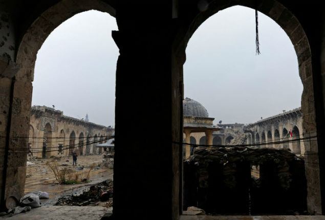 A combination picture shows Aleppo's Umayyad mosque, Syria, before it was damaged on March 12, 2009 (top) and after it was damaged (bottom) December 13, 2016. REUTERS/Omar Sanadiki SEARCH "ALEPPO HERITAGE" FOR THIS STORY. SEARCH "WIDER IMAGE" FOR ALL STORIES. ORG XMIT: PXP27 [aleppo12]
