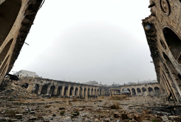 A combination picture shows Aleppo's Umayyad mosque, Syria, before it was damaged on March 12, 2009 (top) and after it was damaged December 13, 2016. REUTERS/Omar Sanadiki SEARCH "ALEPPO HERITAGE" FOR THIS STORY. SEARCH "WIDER IMAGE" FOR ALL STORIES. ORG XMIT: PXP20 [aleppo32]