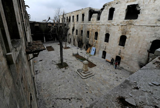 A combination picture shows al-Sheebani school's courtyard, in the Old City of Aleppo, Syria before it was damaged on June 6, 2009 (top) and after it was damaged December 17, 2016. REUTERS/Omar Sanadiki SEARCH "ALEPPO HERITAGE" FOR THIS STORY. SEARCH "WIDER IMAGE" FOR ALL STORIES. ORG XMIT: PXP25 [aleppo72]
