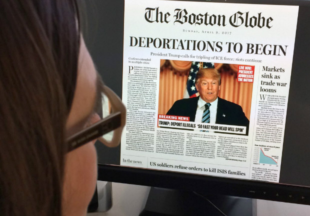 Mulher l uma capa falsa do jornal americano "Boston Globe" dizendo que Trump vai deportar imigrantes