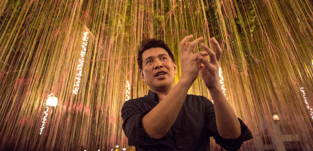 This picture taken on October 17, 2016 shows Philippine director Brillante Mendoza gesturing as he answers questions during an interview in Manila. Award-winning Philippine director Mendoza has turned his cinematic skills to promoting someone many in the West would see as an unlikely hero -- President Rodrigo Duterte and his deadly drug war. / AFP PHOTO / NOEL CELIS / TO GO WITH Philippines-crime-drugs-Duterte-Entertainment-Mendoza, FOCUS by Ayee MACARAIG ORG XMIT: NC002