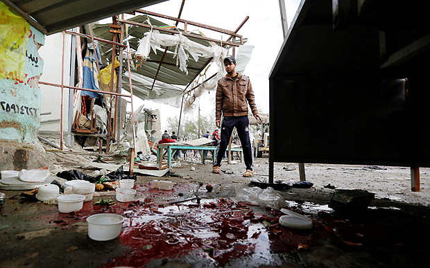 Blood stains are seen at the site of car bomb attack in a busy square at Baghdad's sprawling Sadr City district, in Iraq January 2, 2017. REUTERS/Ahmed Saad ORG XMIT: GGGBAG516