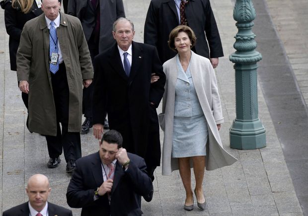 Former President of the United States George W. Bush and wife Laura Bush arrive near the east front steps of the Capitol Building before President-elect Donald Trump is sworn in at the 58th Presidential Inauguration on Capitol Hill in Washington