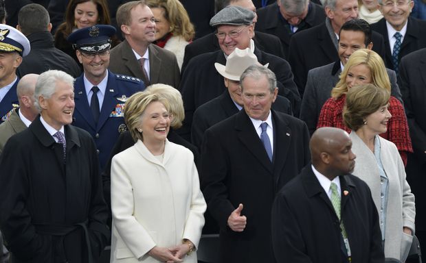 Former President George W. Bush, right, his wife Laura, Former Secretary of State Hillary Clinton and Former President Bill Clinton wait for the 58th Presidential Inauguration for President-elect Donald Trump at the U.S. Capitol in Washington, Friday, Jan. 20, 2017.