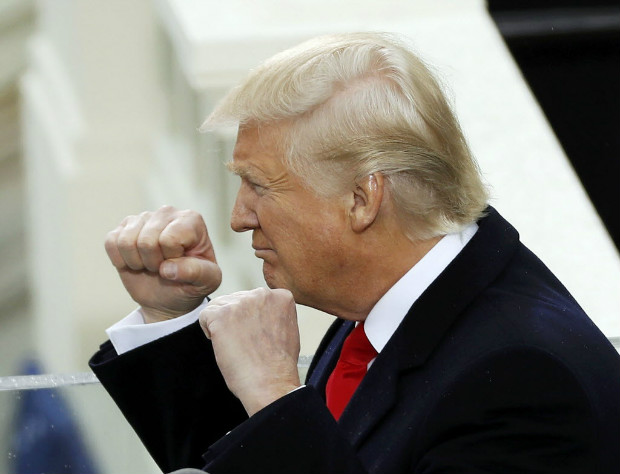 US President Donald Trump gestures after taking the oath of office during his inauguration at the U.S. Capitol in Washington, U.S., January 20, 2017. REUTERS/Kevin Lamarque ORG XMIT: MSF891